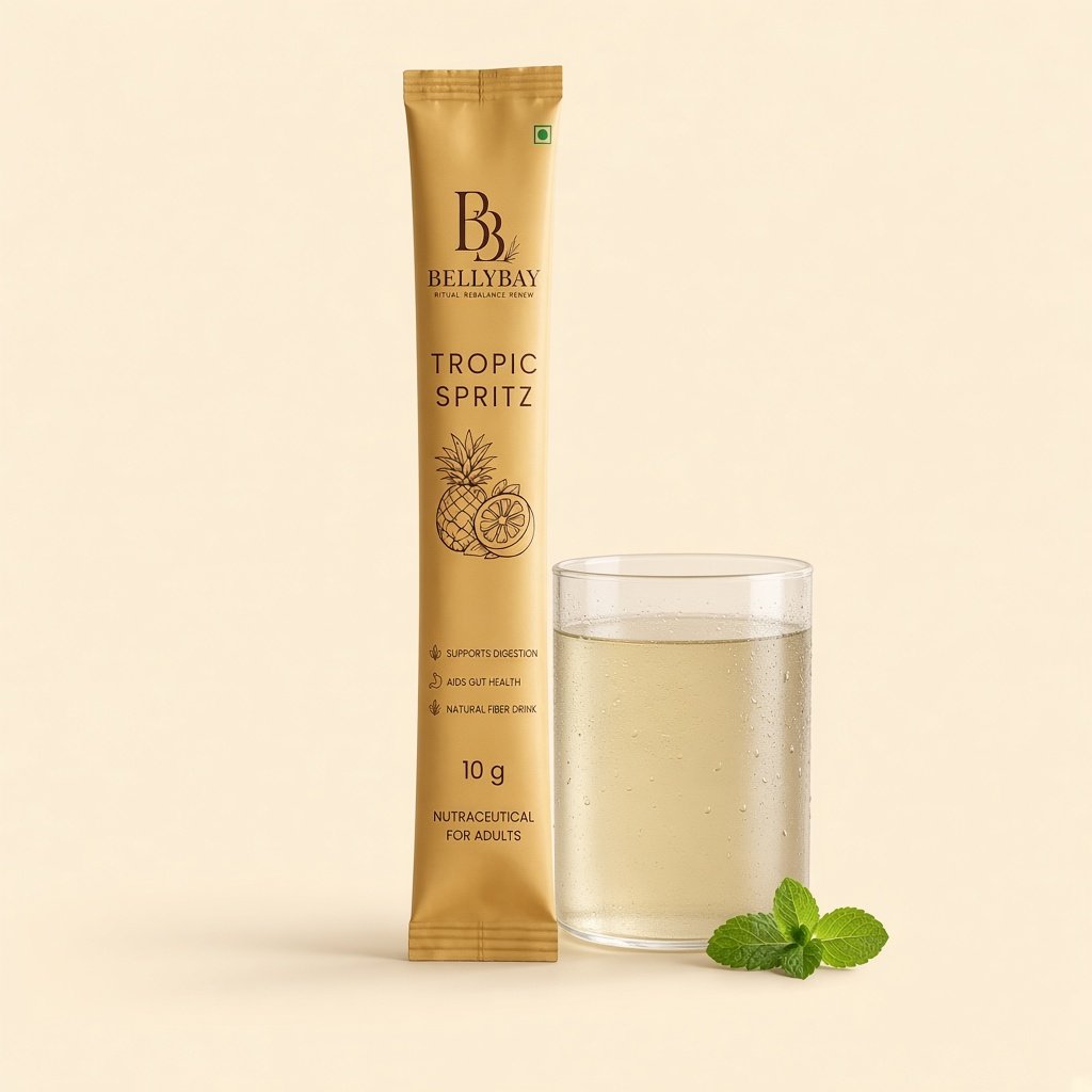BellyBay Tropic Spritz sachet with a glass of Tropic Spritz